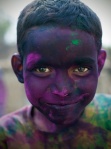 Portrait of a boy at Holi festival